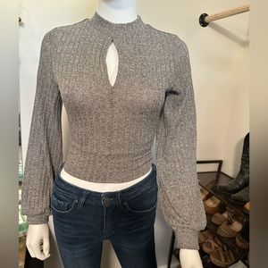 Fancy sleeve backless Bow-Tie sweater.